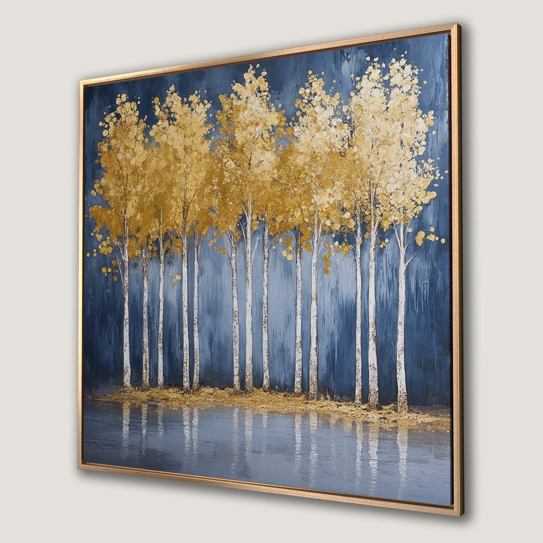 Framed Wall Art: Golden trees against a deep blue background. Modern abstract painting with a serene, nature-inspired aesthetic.