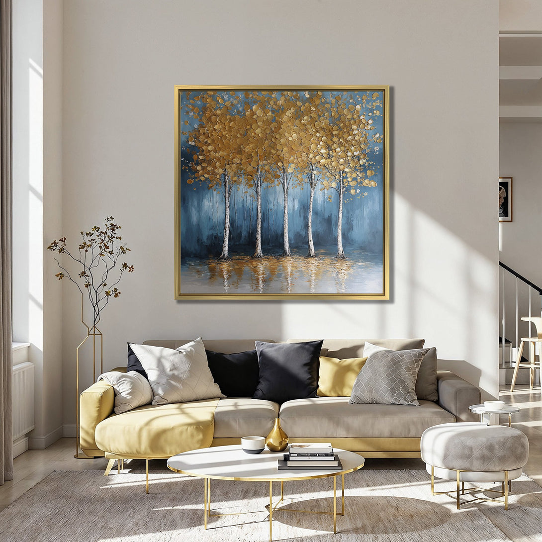 Canvas Print of golden trees painting in a modern interior. Featuring a blue and gold color palette, perfect for living room decor.