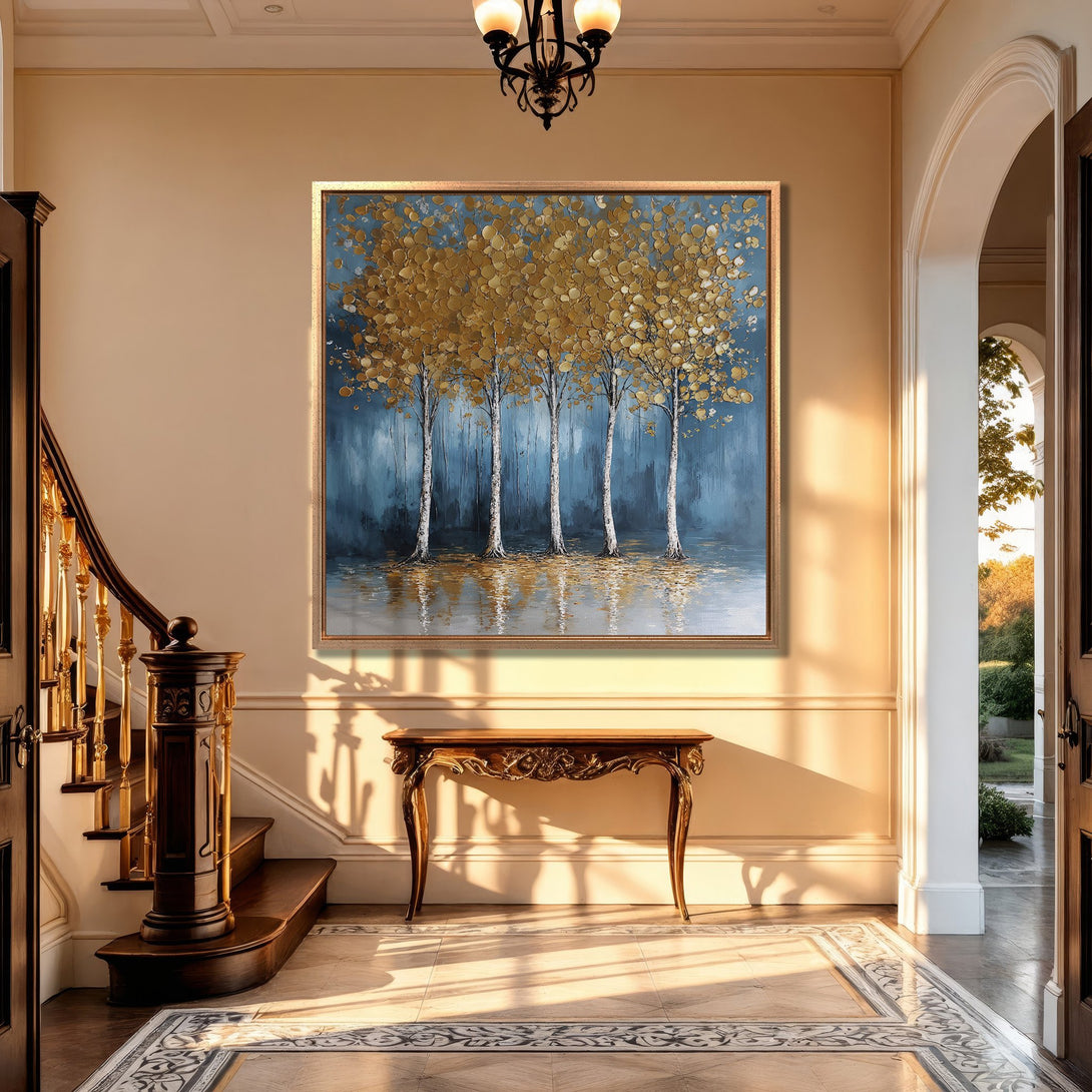 Framed Wall Art: Abstract gold leaf tree painting in blue and gold tones, displayed in a luxurious interior. Enhance your home decor with this stunning canvas print.