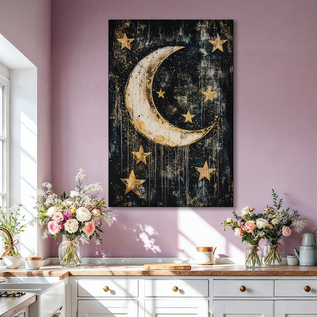 Framed Wall Art featuring a celestial moon and stars in a gold and black abstract style. Perfect for adding a touch of elegance to any space.