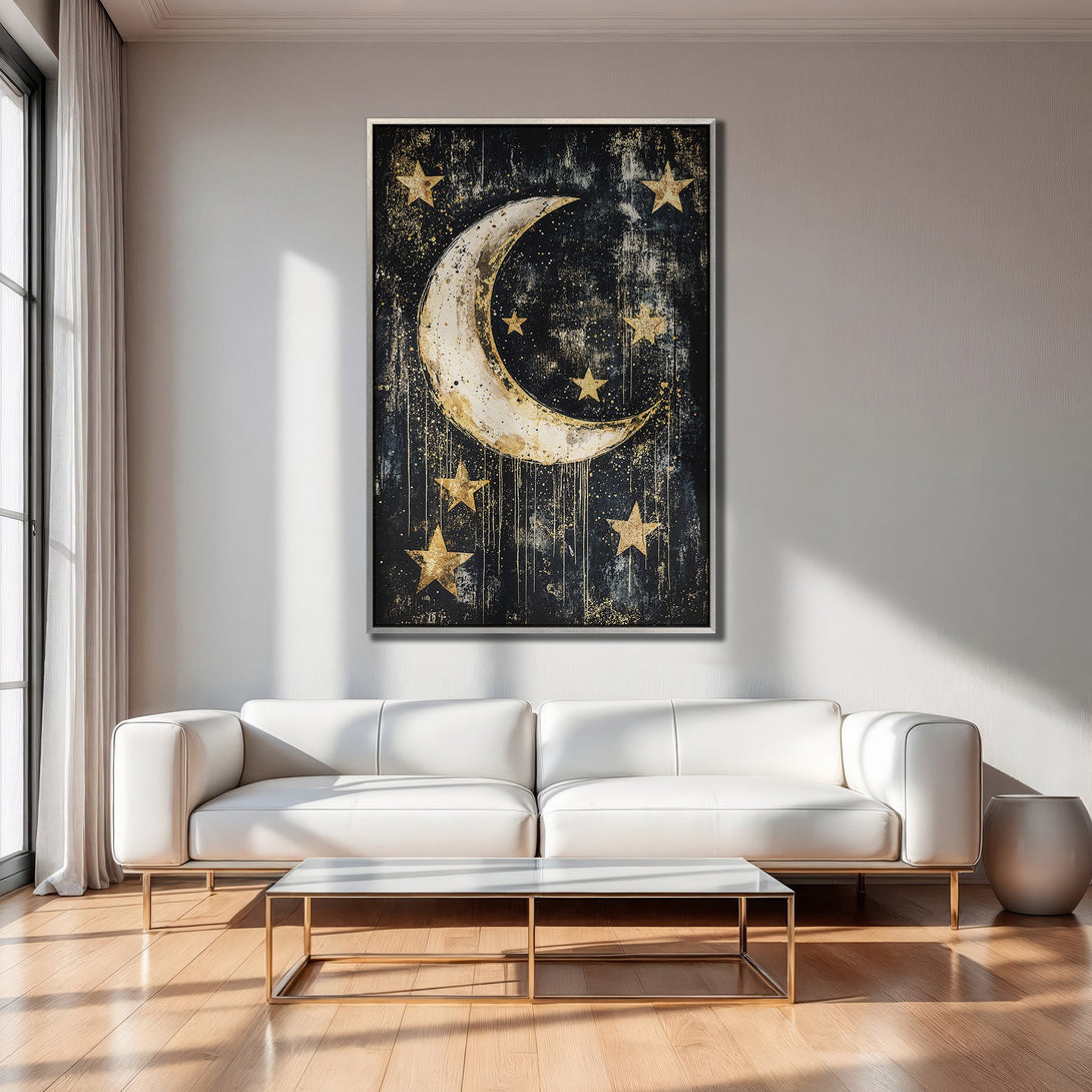 Framed Wall Art: Celestial moon and stars canvas print in a modern living room. Black, gold, and white color palette, perfect for adding a touch of elegance.