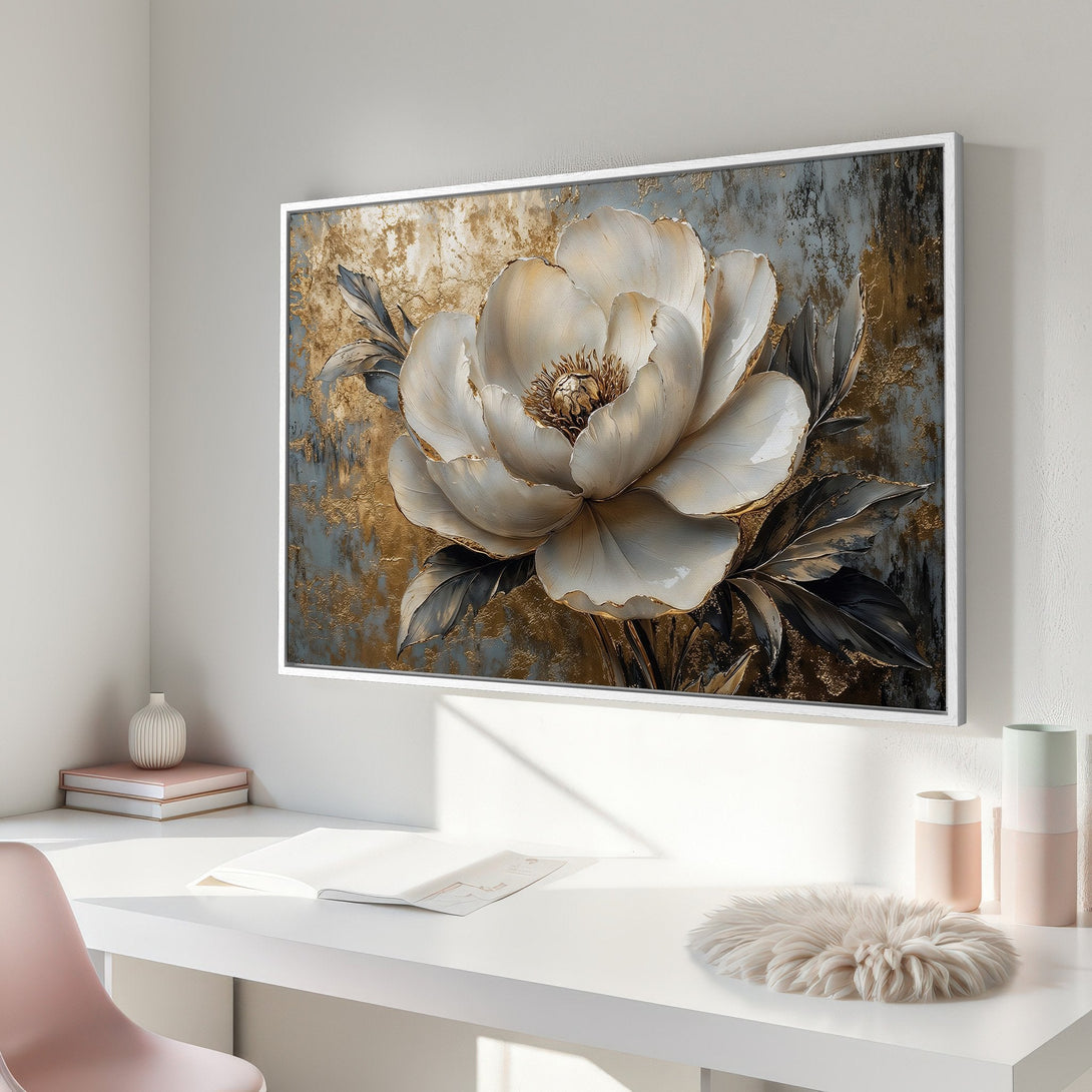 Framed Wall Art featuring a large, elegant white flower with gold accents on a textured, gray and gold background. Modern floral art for home decor.