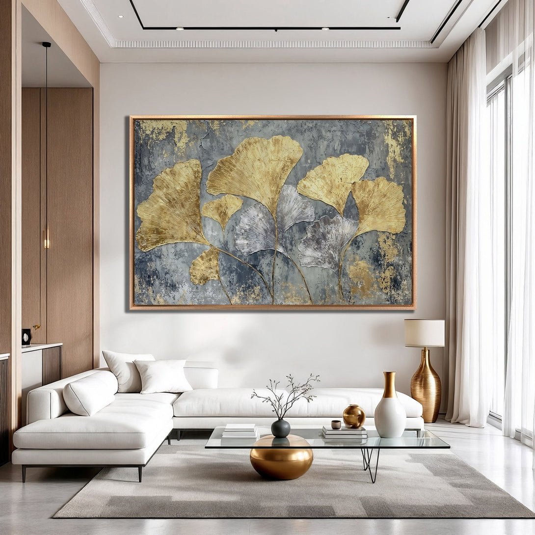 Framed Wall Art: Gold leaf ginkgo art print in a modern living room. Gray, gold, and neutral color palette. Elevate your space with this stunning artwork.