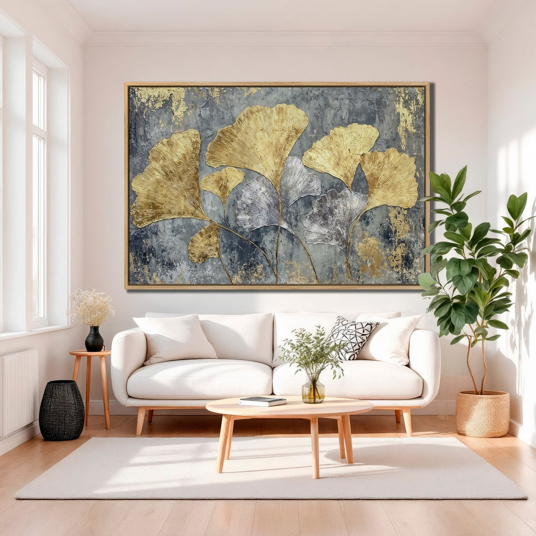 Framed Wall Art featuring gold ginkgo leaves on a textured gray background. Modern art with a touch of luxury, perfect for living room decor.