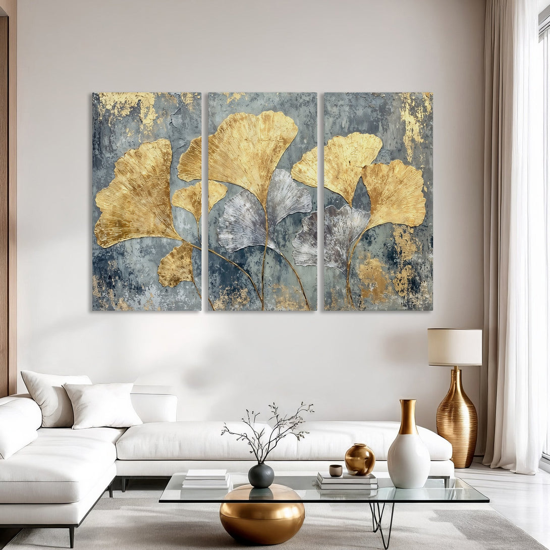 Canvas Print of gold leaf art on a textured gray background. Modern, elegant wall decor with a gold and gray color palette.
