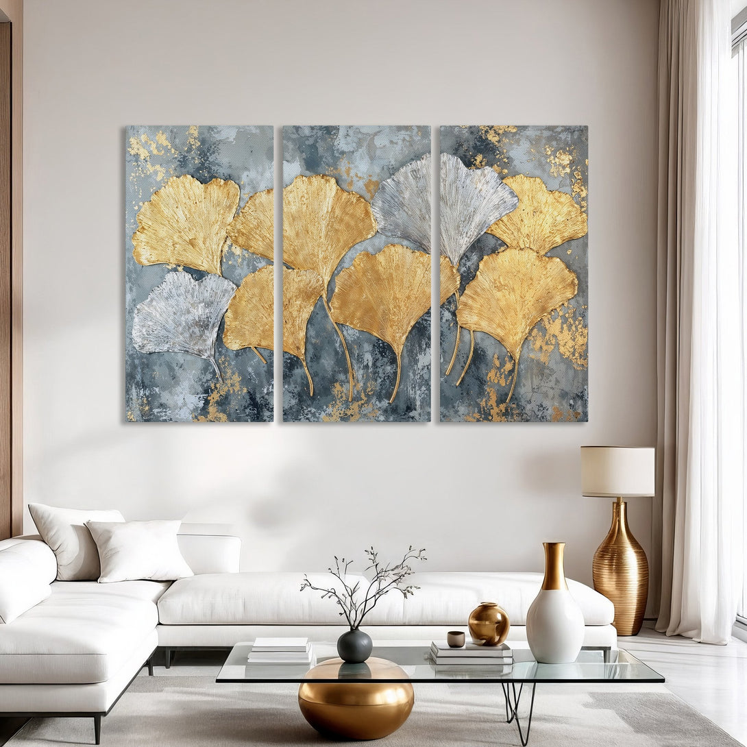 Canvas Print of gold and silver ginkgo leaves on a gray background. Modern abstract art with a luxurious, neutral color palette.