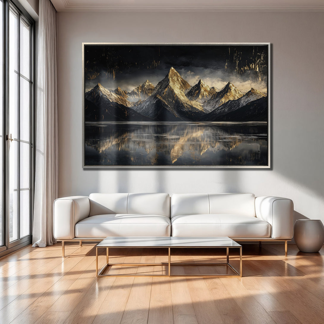 Framed Wall Art of majestic mountains reflected in water. Modern, moody art in a dark, gold, and gray color palette, perfect for any living room.
