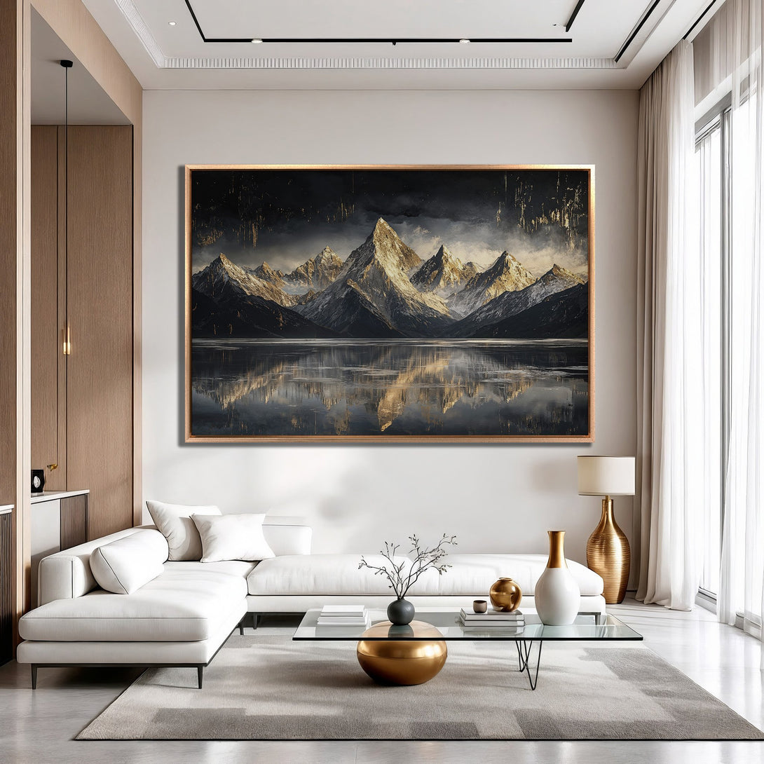 Framed Wall Art: Majestic mountain landscape Canvas Print in a modern interior. Dramatic, moody art with a neutral, gold, and black color palette.