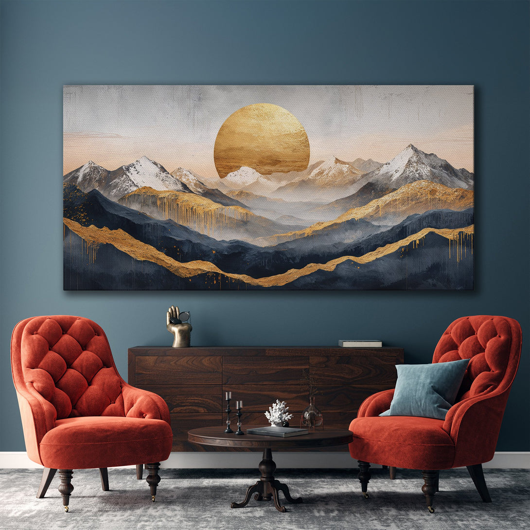 Framed Wall Art featuring a mountain landscape in a gold, blue, and neutral color palette. Modern art for a stylish living room.