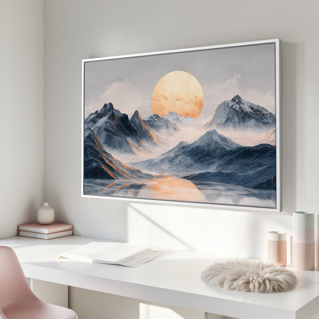 Framed Wall Art featuring a serene mountain landscape with a warm sunset. The canvas print offers a calming aesthetic with a cool blue and orange color palette.