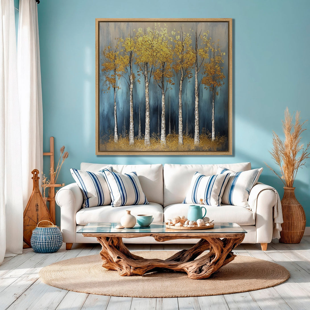 Framed Wall Art featuring golden birch trees in an abstract style, set against a blue and gold color palette, perfect for adding a touch of nature to your home.