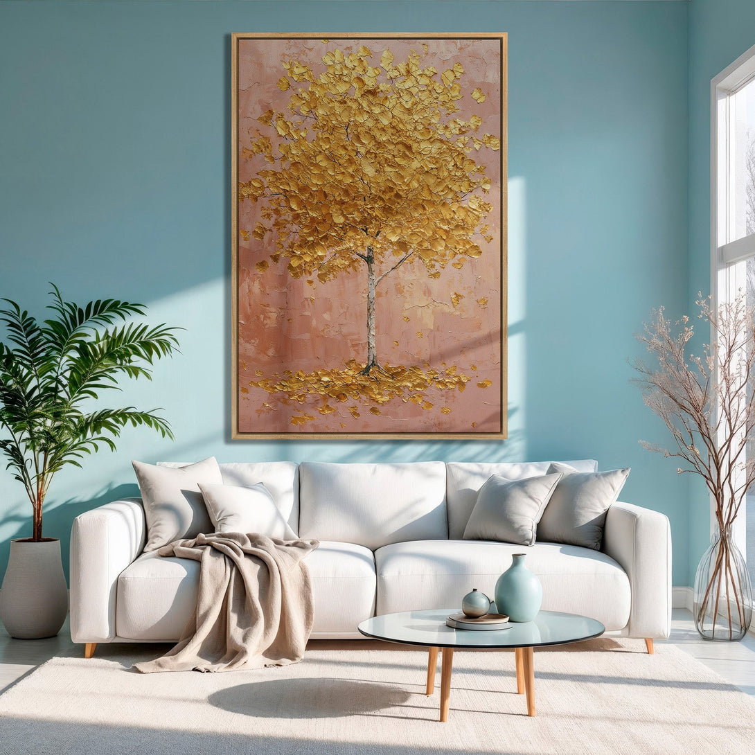 Framed Wall Art: Golden tree painting on canvas, warm tones, displayed in a modern living room with a serene blue wall. Add a touch of elegance to your space!