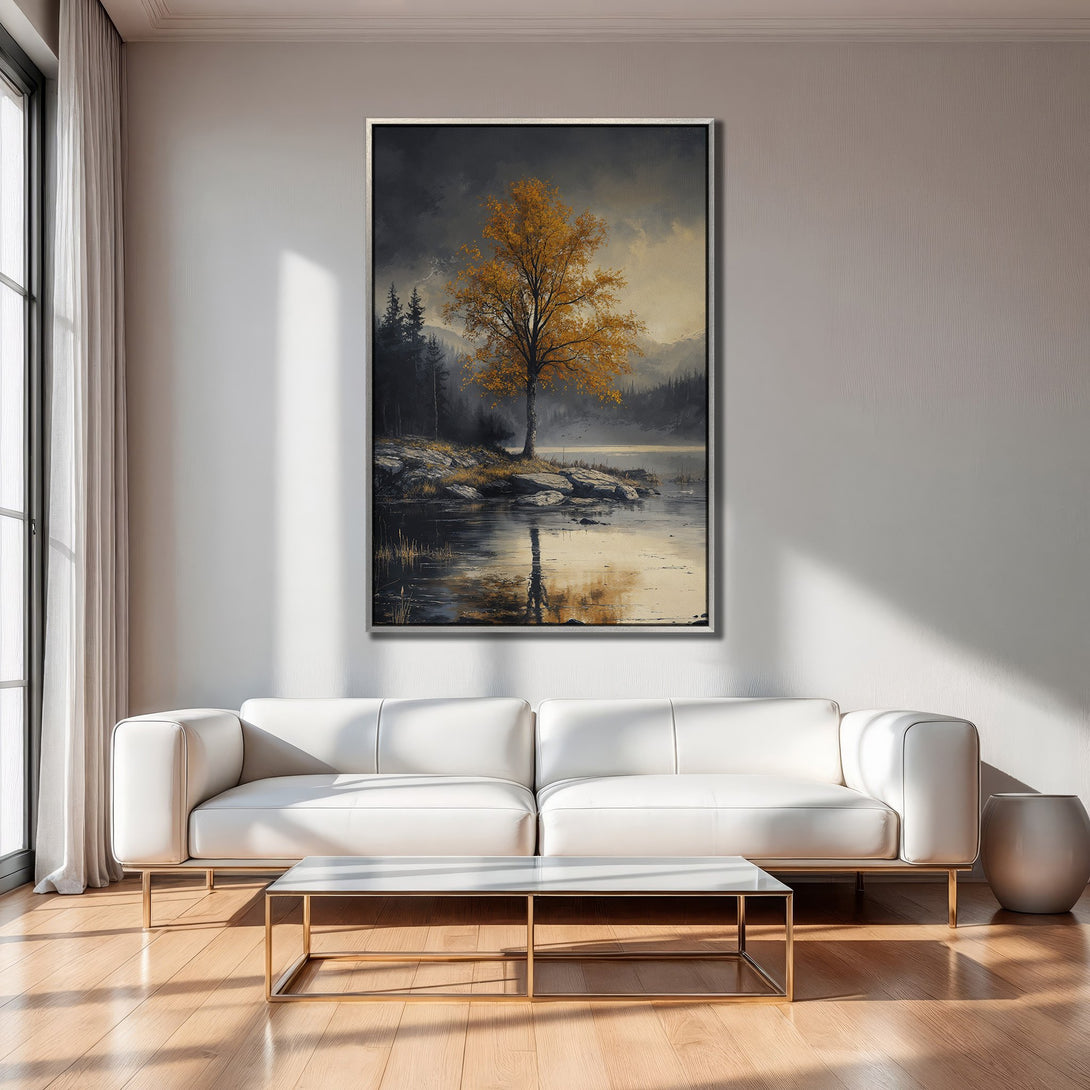 Framed Wall Art of a golden tree by a lake, displayed in a modern living room. Earthy tones and a serene landscape create a calming atmosphere.