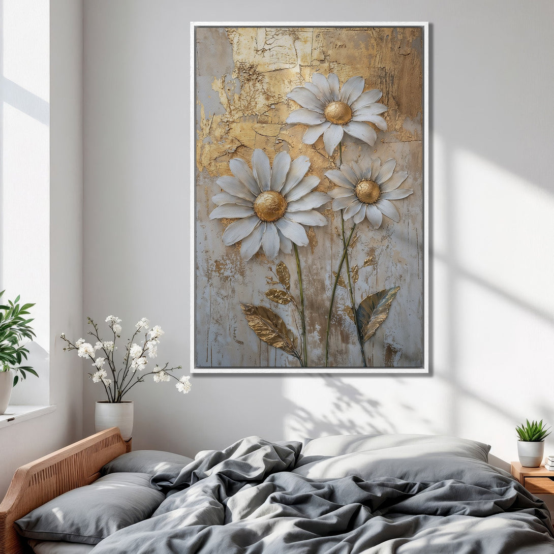 Framed Wall Art featuring textured daisies in gold and white. Elegant floral canvas print for bedroom decor. Neutral color palette.