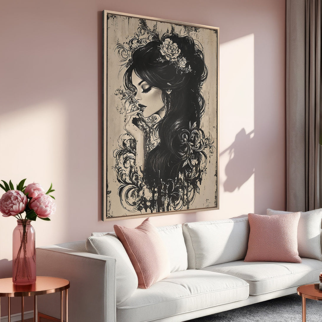 Framed Wall Art featuring a woman with long black hair, in a romantic style. Soft pink and neutral tones create a calming interior design.