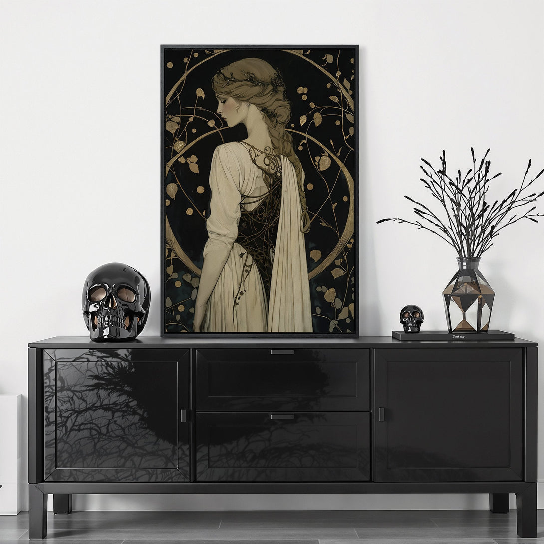Framed Wall Art featuring an Art Nouveau woman in a black and gold color palette. Elevate your space with this elegant canvas print.