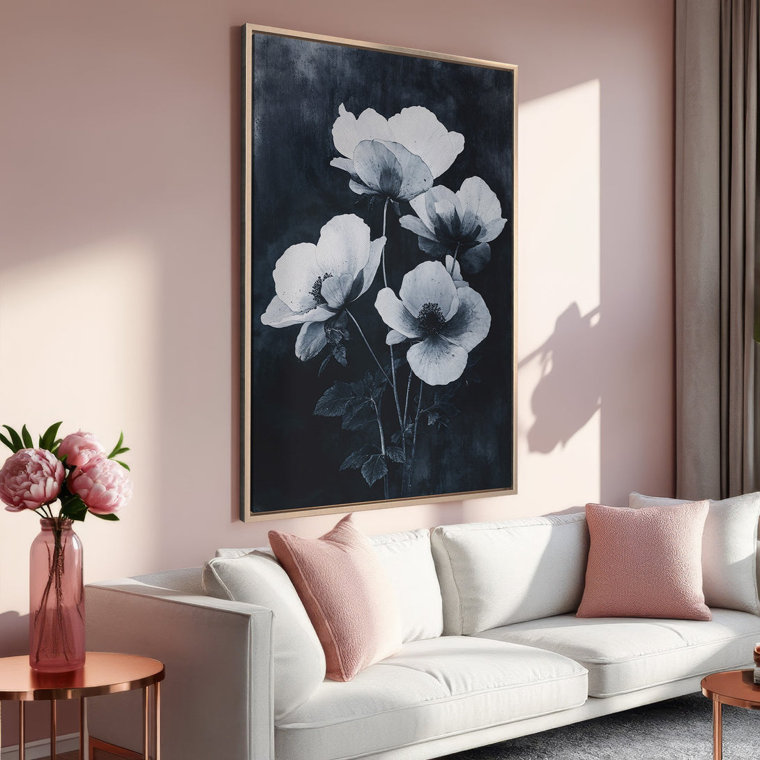 Framed Wall Art featuring elegant monochrome floral art. Stylish home decor with a soft blush and navy blue color palette. Perfect for a modern living room.