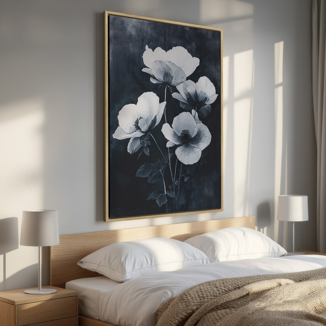 Framed Wall Art featuring elegant monochrome floral print. Modern bedroom decor with a calming black, white, and neutral color palette. Shop this Canvas Print today!