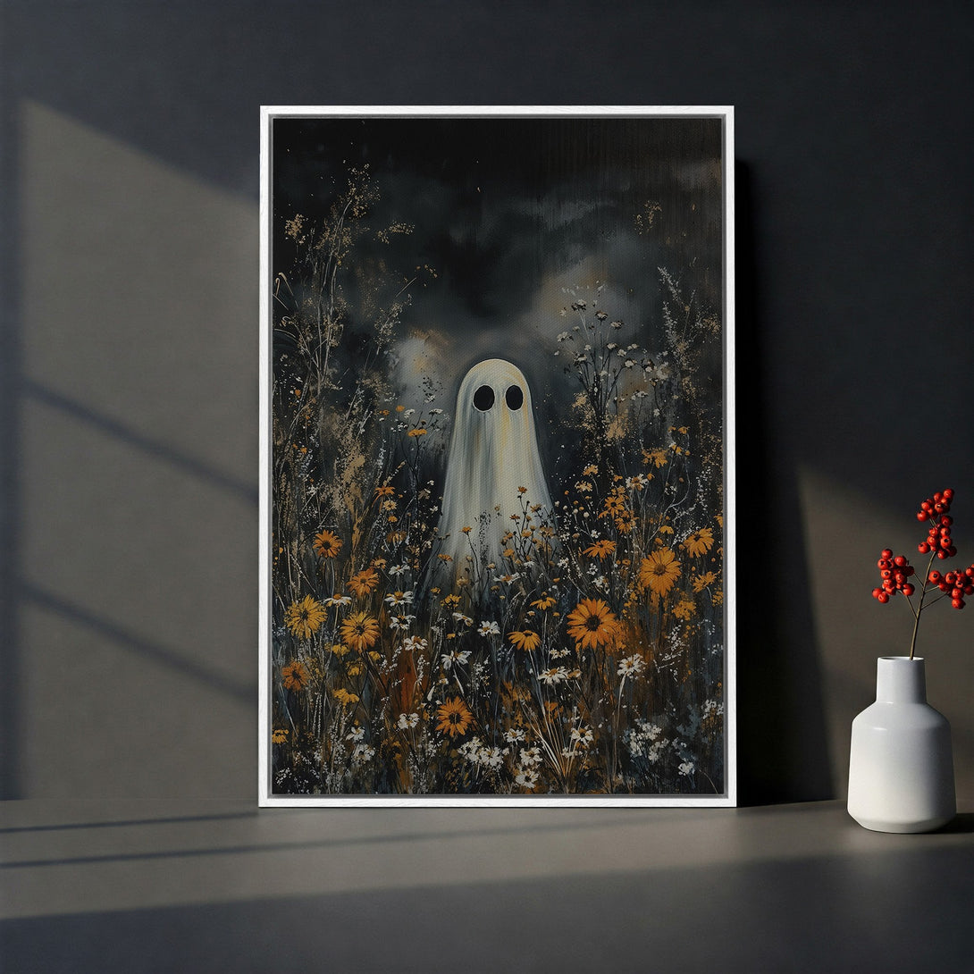 Framed Wall Art featuring a whimsical ghost in a field of flowers. Dark, moody color palette with pops of yellow and white. Perfect for adding character to any space.