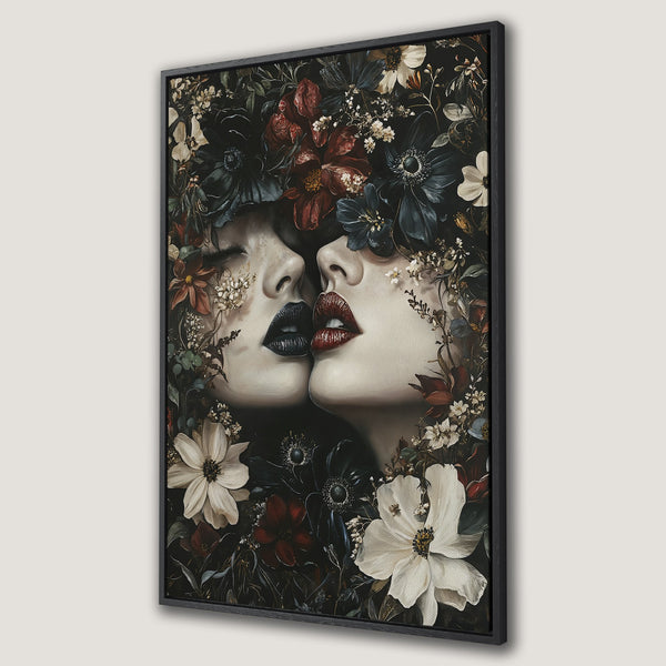 Framed Wall Art featuring a romantic, floral portrait of two women kissing. Dark, moody color palette with red and white roses. Perfect for any interior.