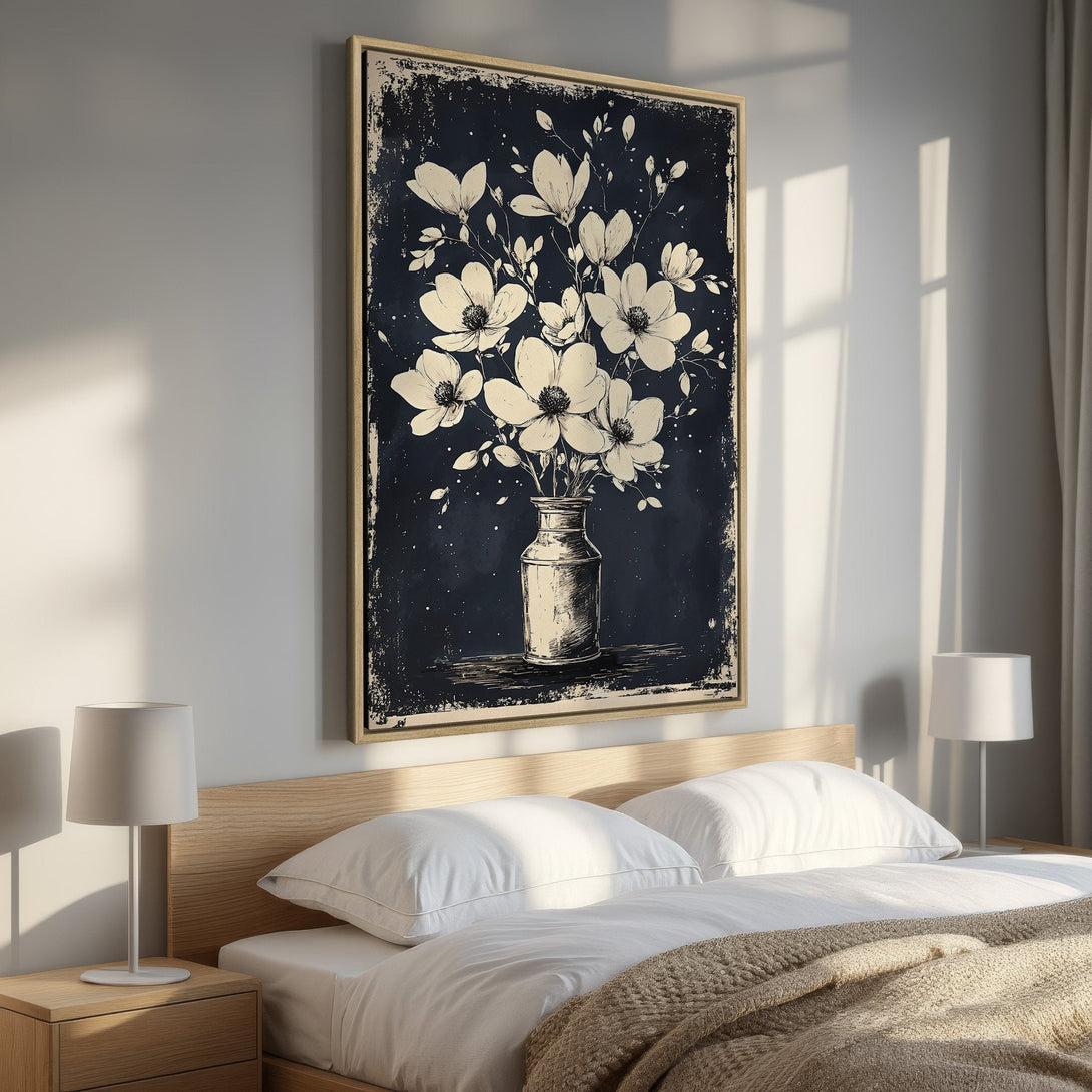 Framed Wall Art featuring elegant white floral art on a dark blue background. Perfect bedroom decor, modern style, neutral color palette.