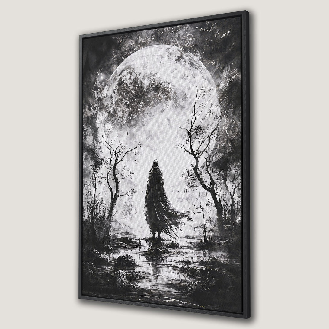 Framed Wall Art: Dramatic black and white canvas print featuring a cloaked figure before a moonlit landscape. Perfect for adding a touch of mystery and gothic style.