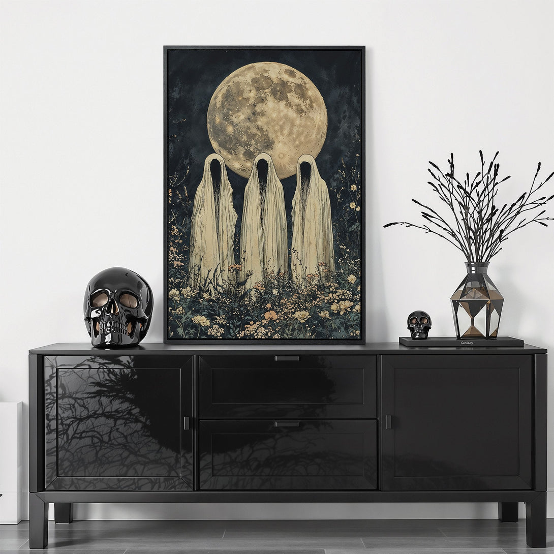 Framed Wall Art featuring ghostly figures under a full moon. Gothic style with a muted, earthy color palette. Perfect for adding a touch of mystery to your home!