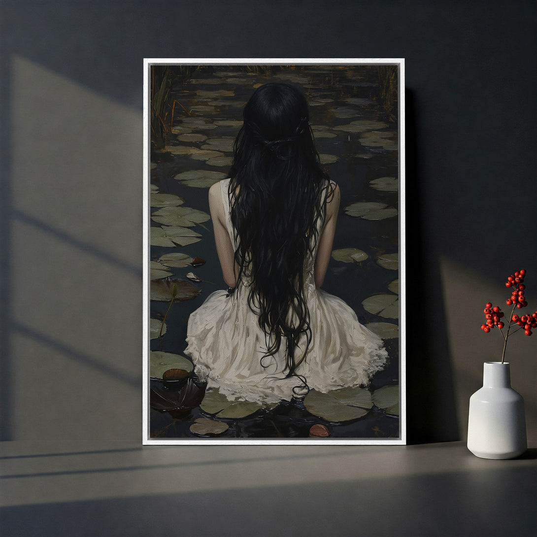 Framed Wall Art: Woman in white dress on lily pads. Moody, romantic art print with dark, muted color palette. Perfect for home decor.