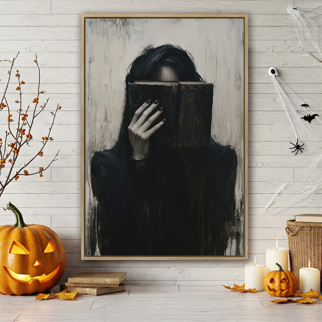Framed Wall Art featuring a mysterious figure with a book, dark and moody aesthetic, perfect for Halloween decor. Black, white, and neutral color palette.