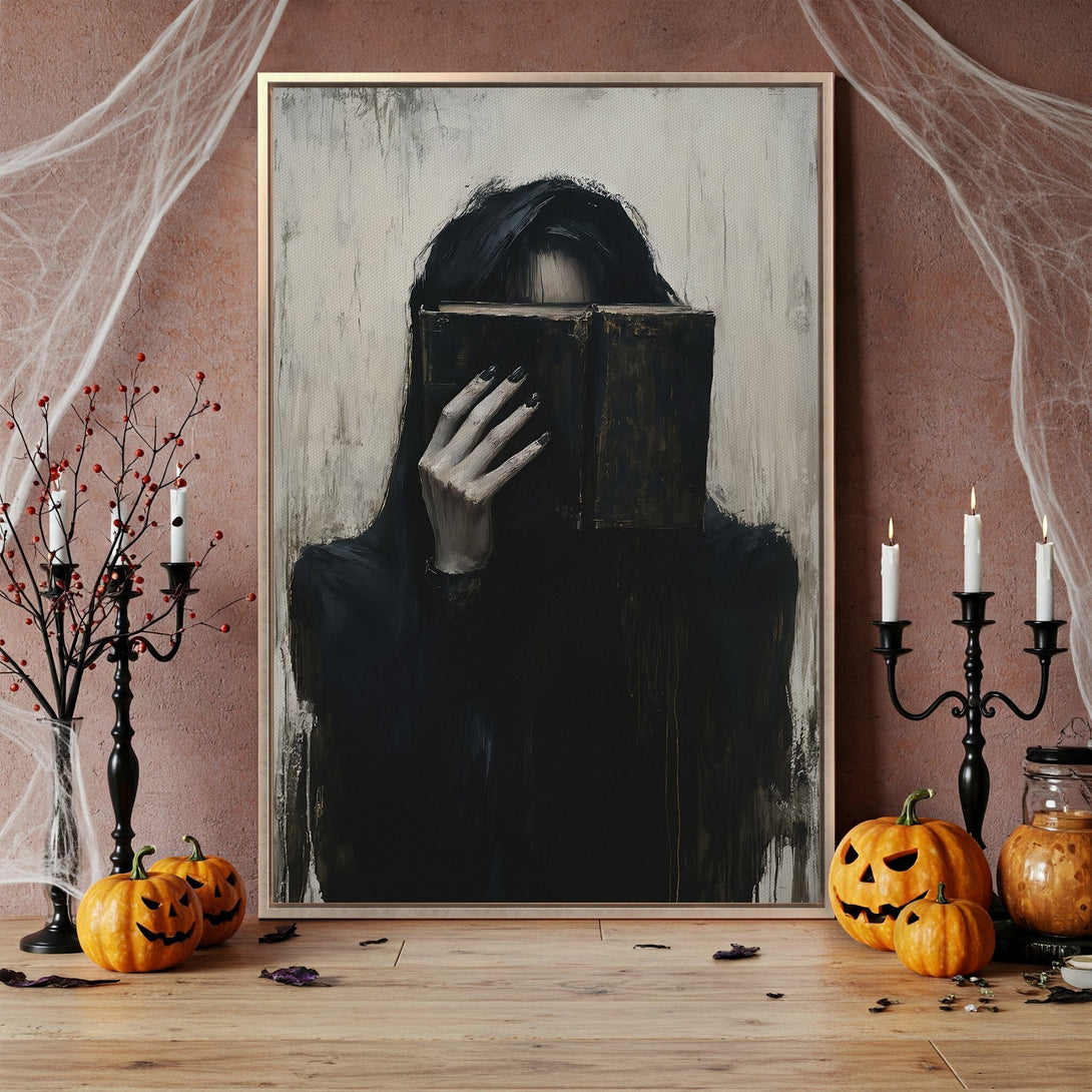 Framed Wall Art featuring a mysterious woman with a book, in a dark, moody style. The color palette is primarily black, white, and beige, perfect for Halloween decor.