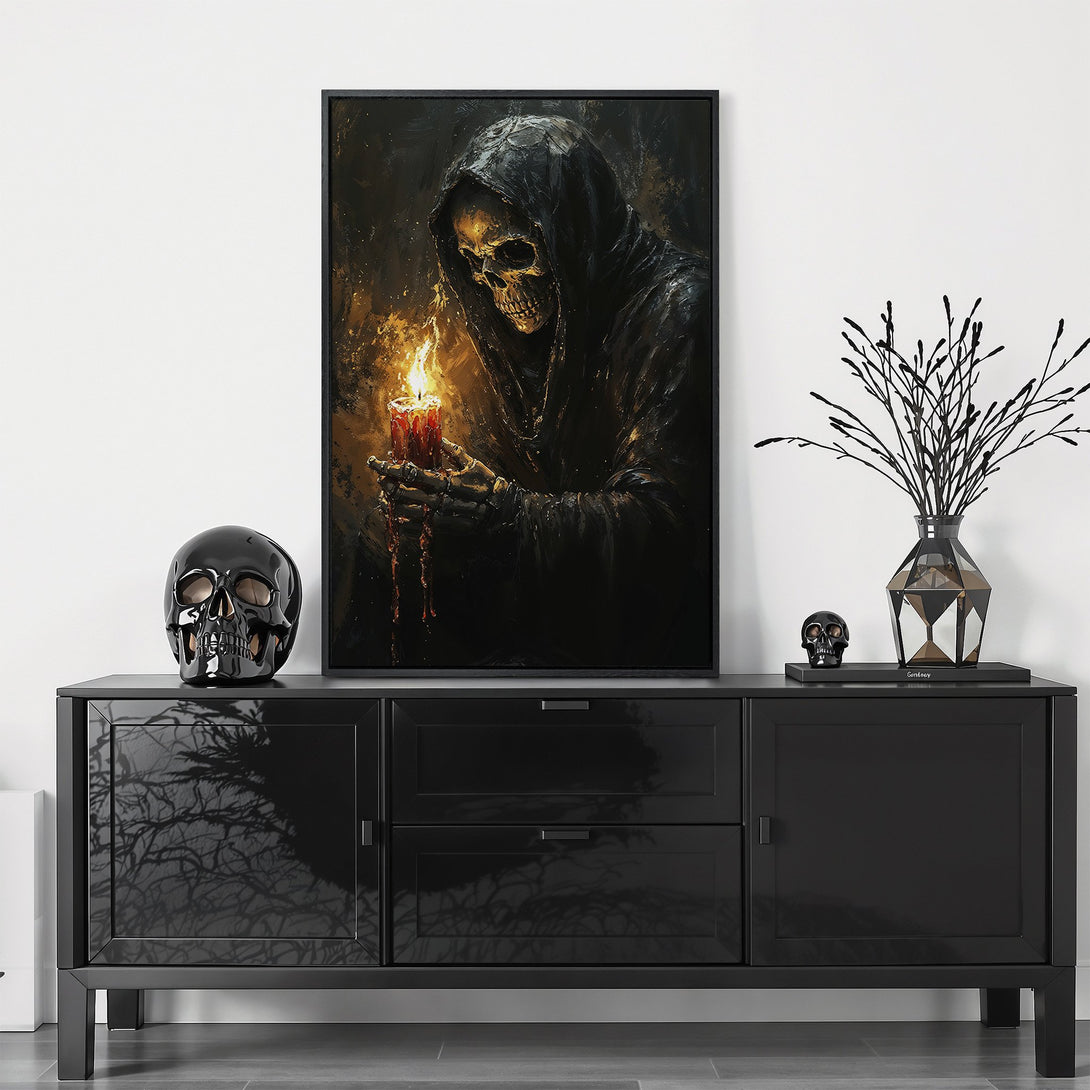 Framed Wall Art featuring a dark, gothic image of a hooded figure holding a candle. Dramatic, moody art with a black and gold color palette. Perfect for Halloween decor.