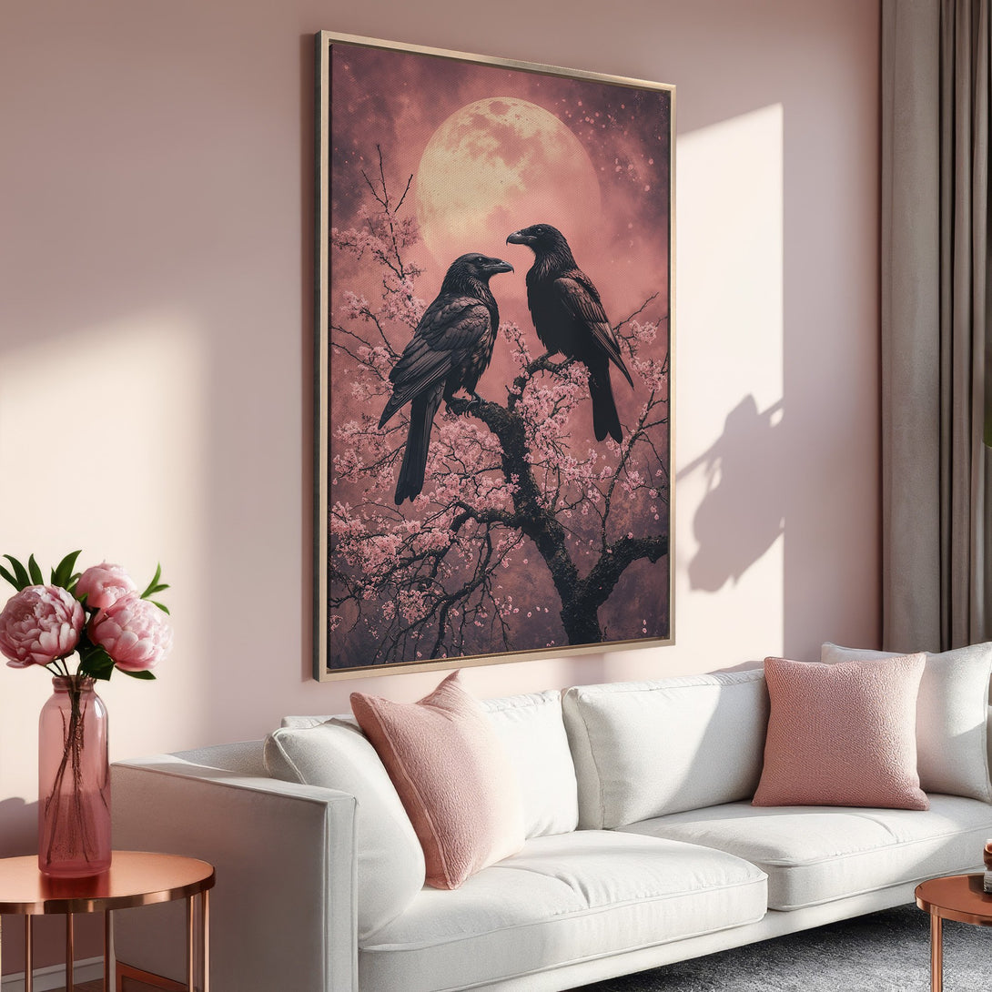 Framed Wall Art: Two ravens perched on a flowering tree against a pink moon backdrop. Romantic, gothic style with a blush and black color palette.