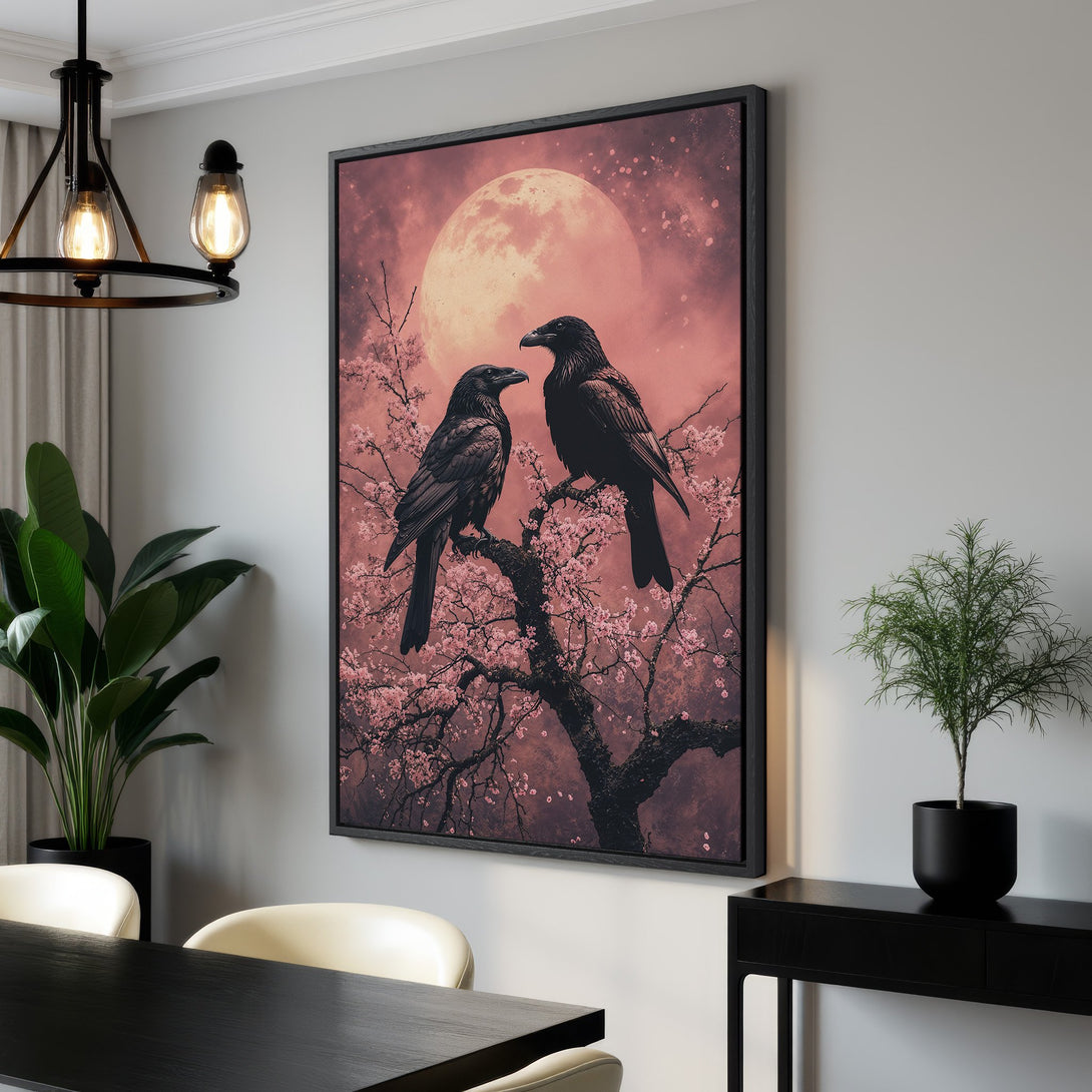 Framed Wall Art: Majestic ravens perched on a blossoming tree against a dreamy pink sky. Modern art with a touch of gothic romance. Perfect for any room!