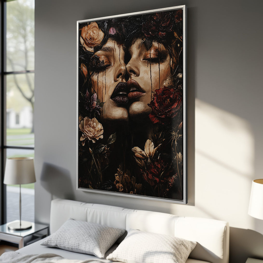 Framed Wall Art featuring a dark, romantic portrait of two faces with flowers. Rich, moody color palette of reds, browns, and blacks. Perfect for bedroom decor.