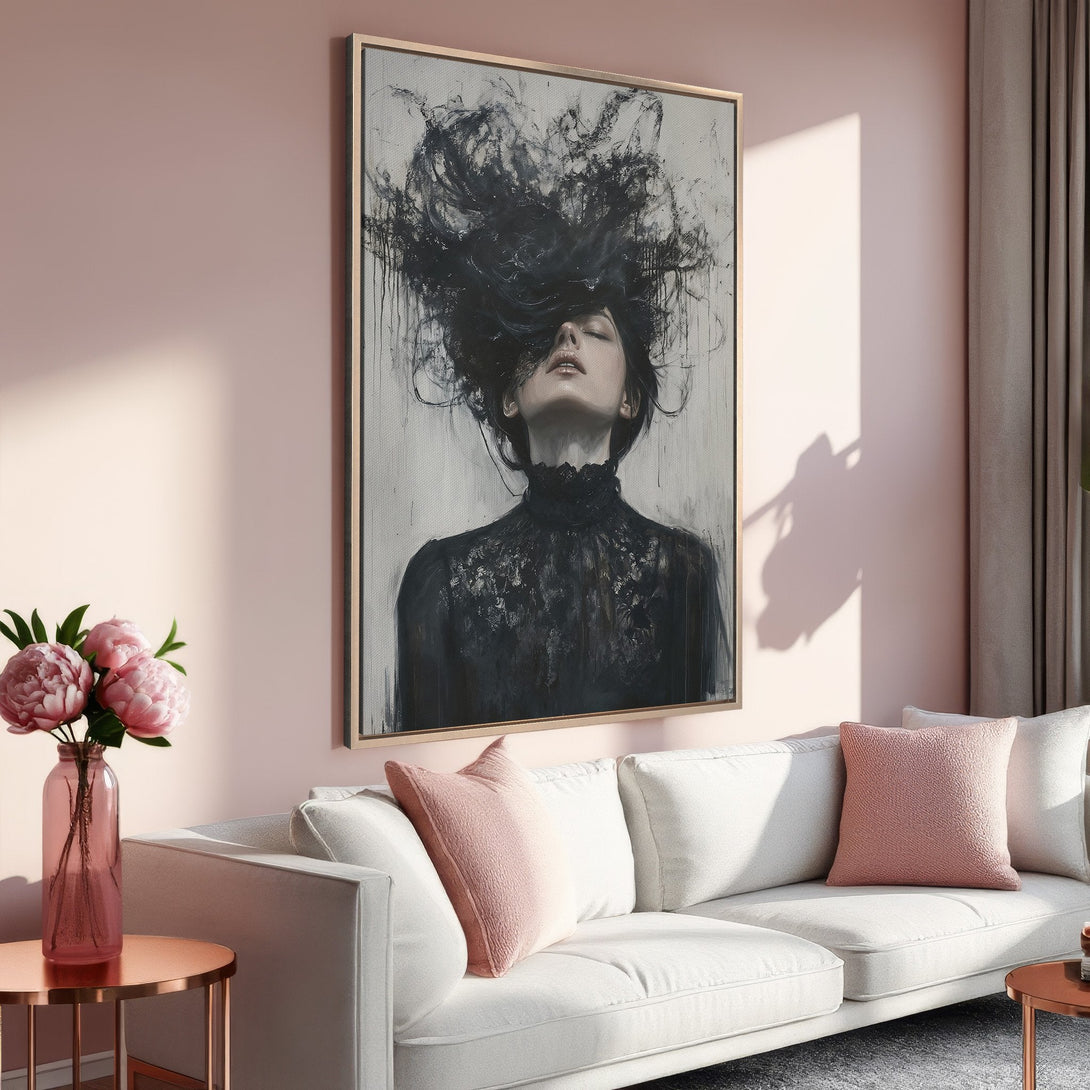 Framed Wall Art featuring a woman with black hair, displayed in a modern interior with a soft pink and neutral color palette. Elevate your space!