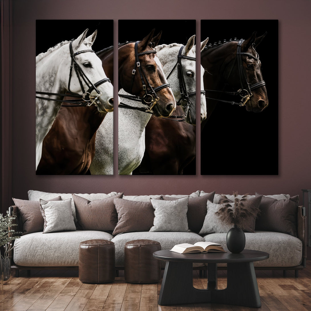 Canvas Print of majestic horses in a dark, dramatic style. Earthy tones and black background create a sophisticated wall art statement.
