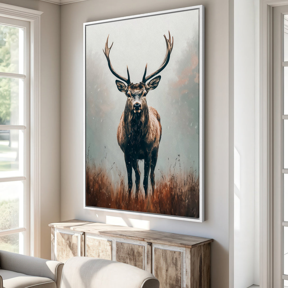 Framed Wall Art featuring a majestic stag in a painterly style with warm brown and muted green tones, displayed in a cozy interior setting.