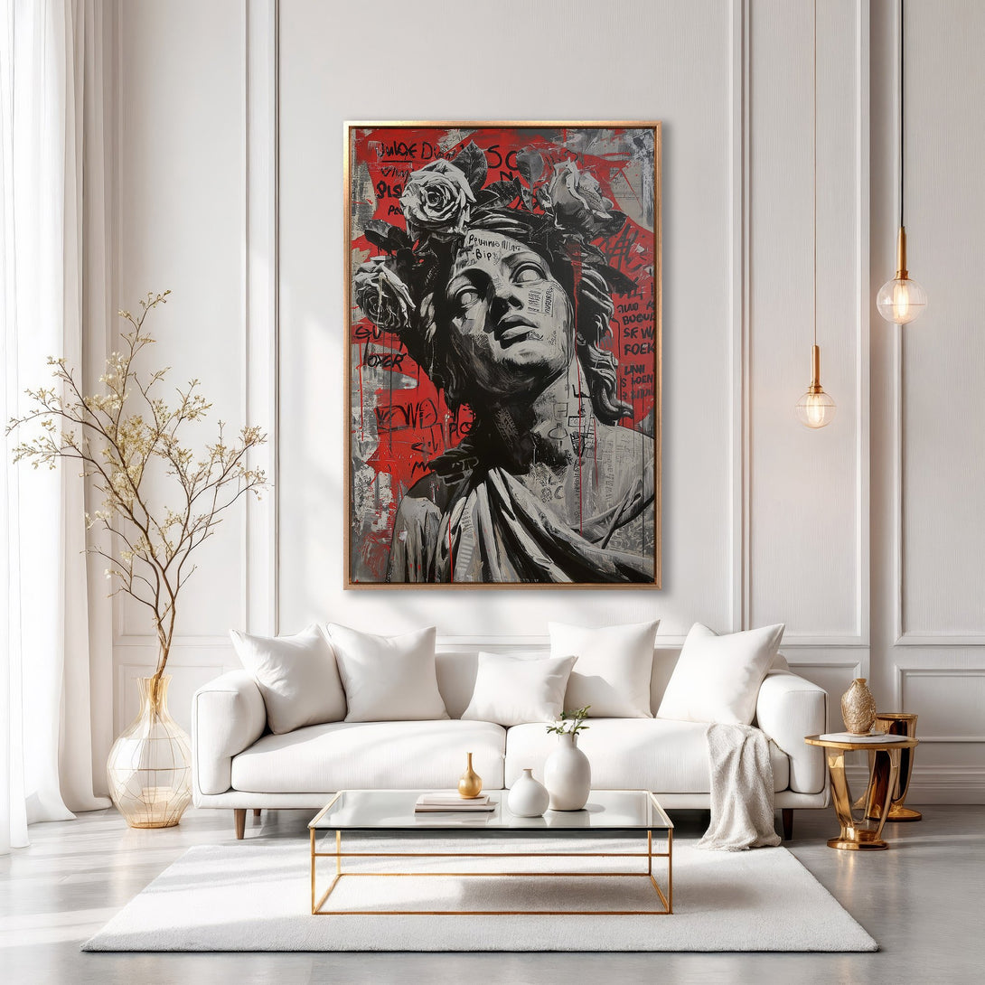 Framed Wall Art: Modern graffiti-style canvas print of a classical bust with roses, in a red, gray, and gold color palette. Perfect for stylish home decor.