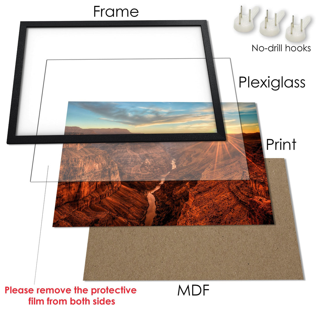 Framed Poster of a canyon landscape. Earthy tones of orange, brown, and blue. Perfect wall art for your home.