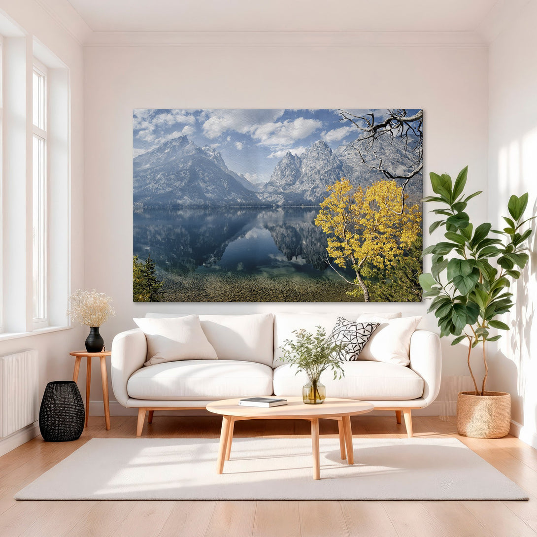 Framed Wall Art: Mountain lake landscape canvas print, gold frame, serene blue and yellow color palette, perfect for living room decor.
