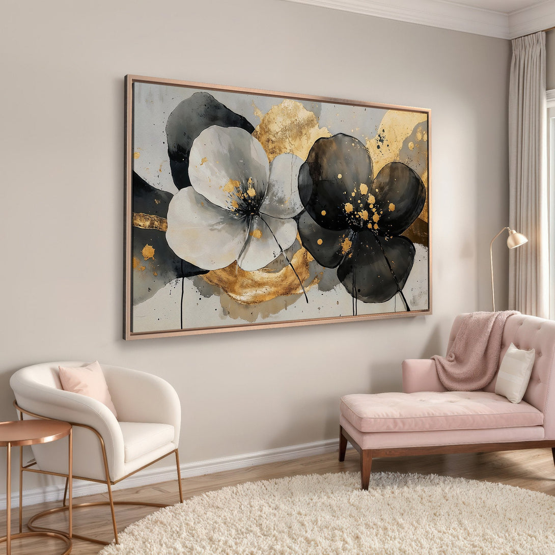 Framed Wall Art of abstract floral design in black, white, and gold. Modern canvas print adds elegance to any room.