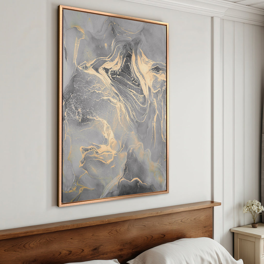 Framed Wall Art: Abstract gray and gold canvas print. Modern art piece with a luxurious, fluid design. Perfect for bedroom decor.