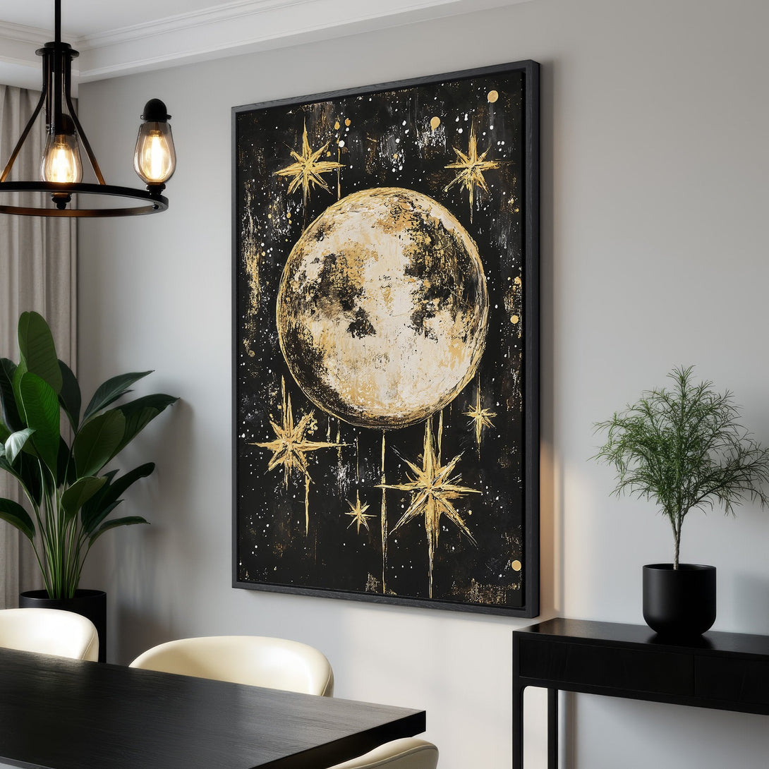 Framed Wall Art: Celestial moon and stars art print in gold and black. Modern, abstract style. Perfect for adding a touch of cosmic elegance to your space.