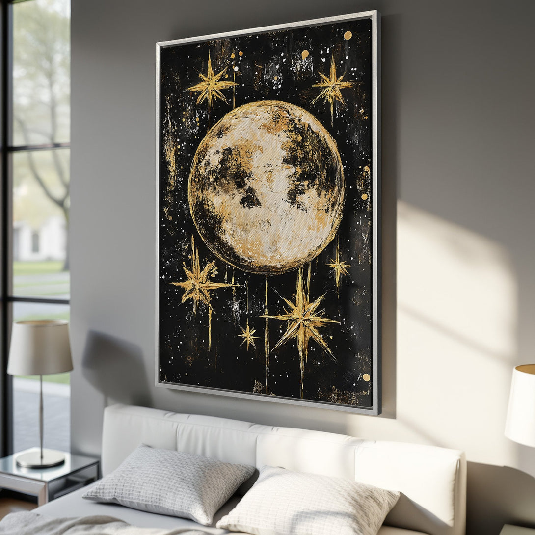 Framed Wall Art: Abstract moon and stars canvas print in a bedroom. Black, gold, and white color palette. Modern celestial art for your home decor.