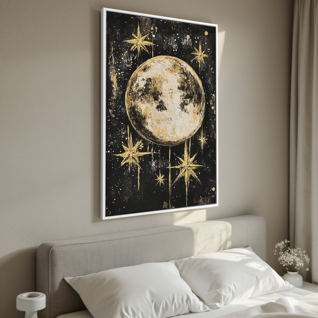 Framed Wall Art featuring a celestial moon and stars in gold and black. Modern abstract style, perfect for bedroom decor.