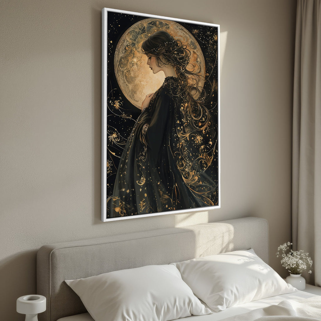 Framed Wall Art featuring a mystical woman with a moon backdrop. Elegant black and gold art print, perfect for bedroom decor. Enhance your space with this stunning canvas print.