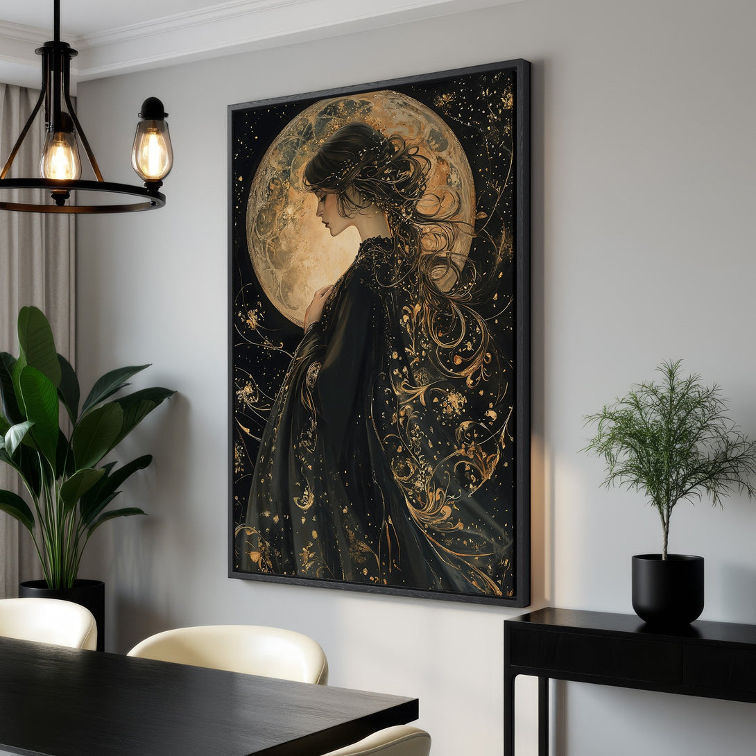 Framed Wall Art: Elegant woman with moon, black & gold color palette. Add a touch of celestial beauty to your home with this stunning canvas print.