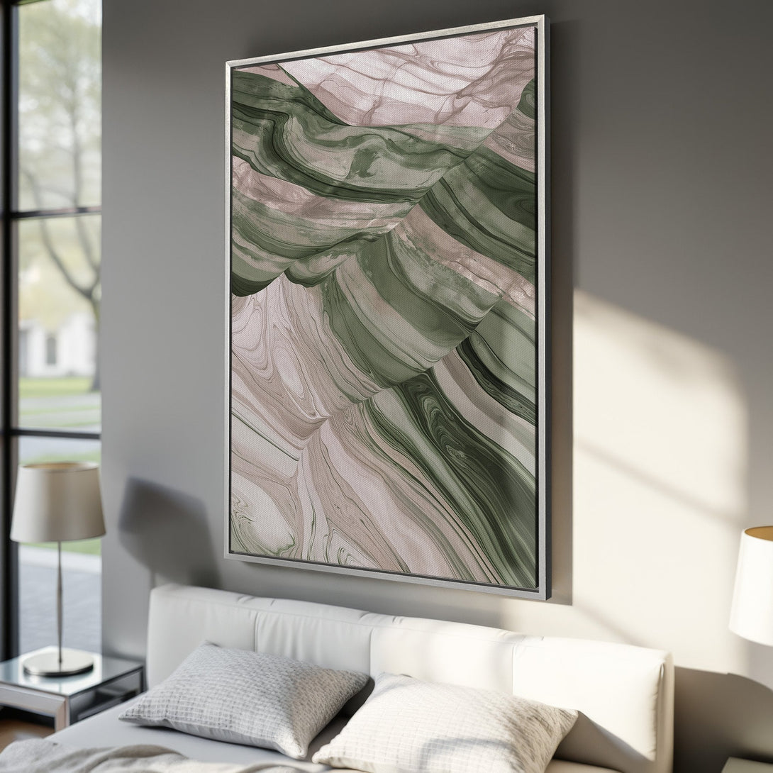 Framed Wall Art featuring an abstract flowing design in green and beige tones. Modern art for bedroom decor. Canvas print adds a touch of elegance.