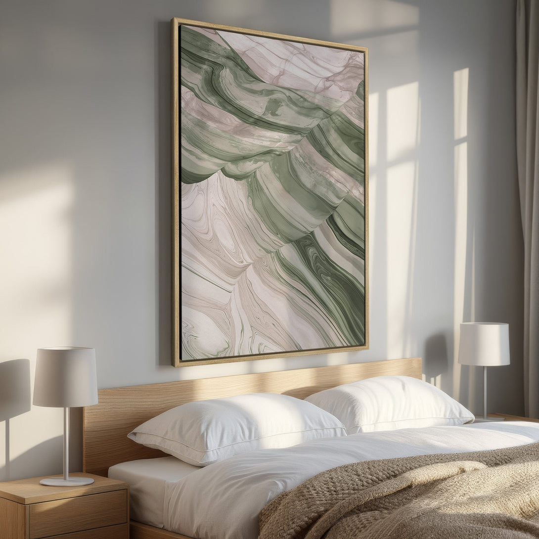 Framed Wall Art featuring an abstract, flowing design in muted green and neutral tones. Perfect for adding a touch of modern elegance to any bedroom.