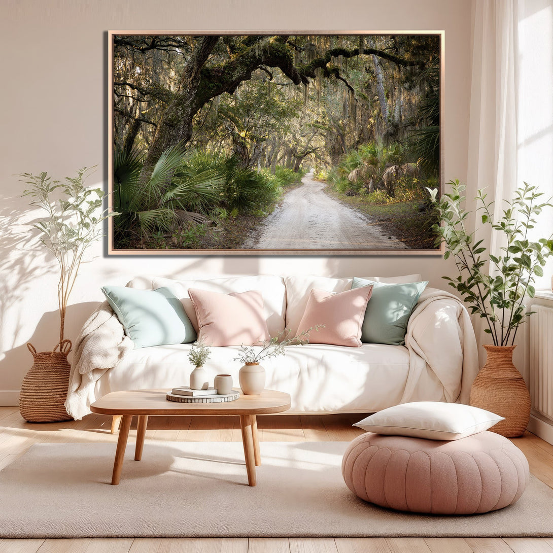 Framed Wall Art of a scenic dirt road through a lush forest. Earthy tones of green, brown, and beige create a calming, natural aesthetic for any home.